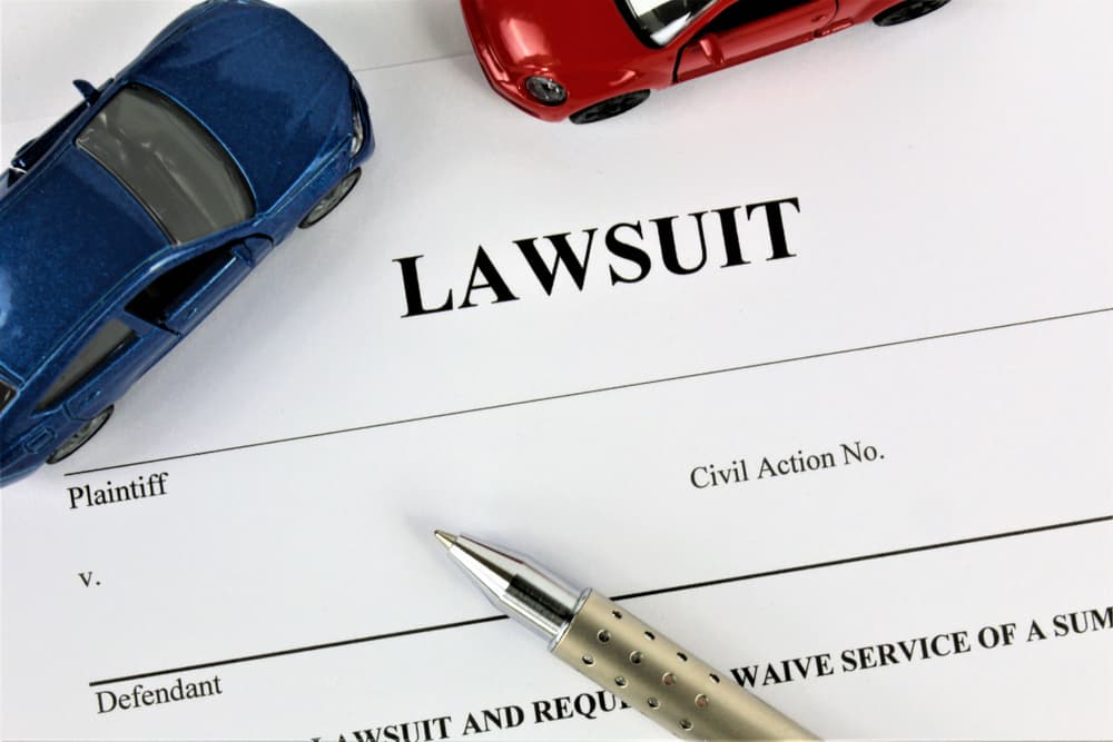 A legal document car accident lawsuit with sample of cars