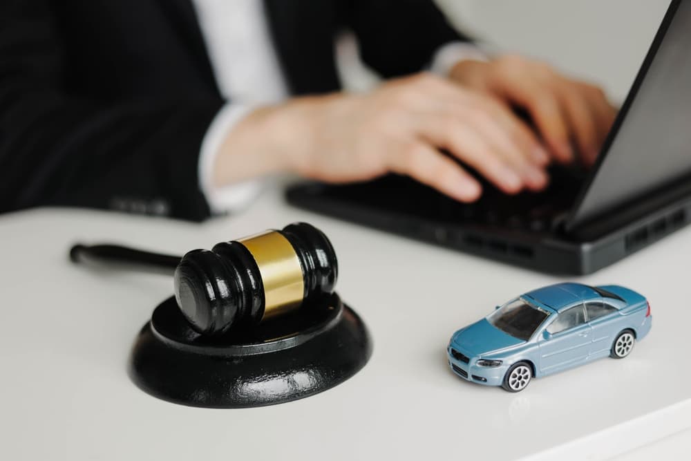 A car accident lawyer working on his laptop